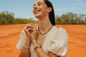 A collection of pearl jewellery pieces part of the Terra Range, featuring ceramic links and set in 18ct yellow gold.