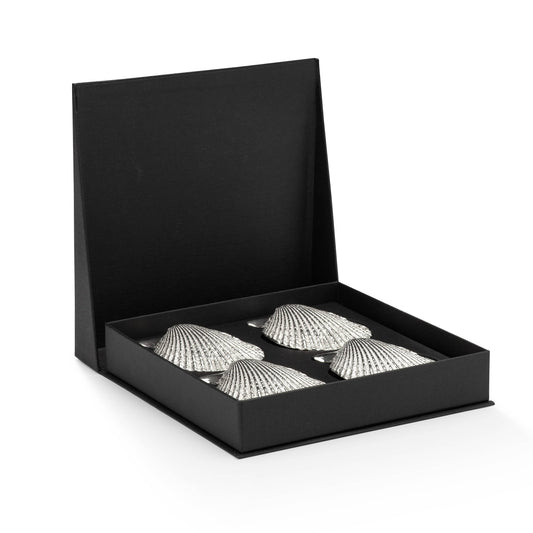 The Amuse Shells are inspired by the elegance of the scallops, Packaged in luxurious black boxes , the Amuse shells are crafted from pure tin and carefully handmade in the Netherlands. Perfect for fish appetizers and other delectable treats, these elegant shells are not suitable for use in ovens or dishwashers.
