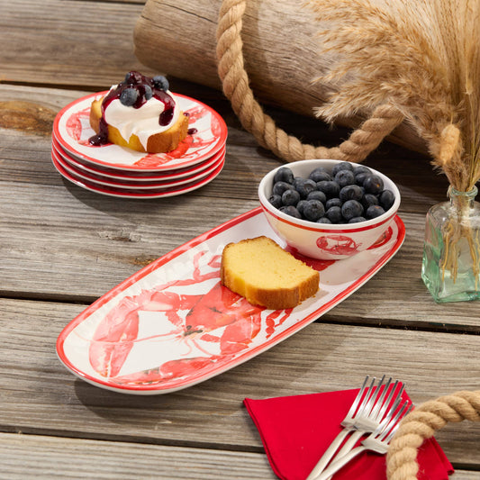 This stunning 15-inch by 6-inch tray, paired with a perfectly sized dip bowl, is designed for serving your favorite appetizers, finger foods, or seafood delicacies with a nautical touch. The tray showcases a vibrant red lobster design that captures the spirit of seaside living, while the matching bowl complements the aesthetic with its charming, ocean-inspired motif.