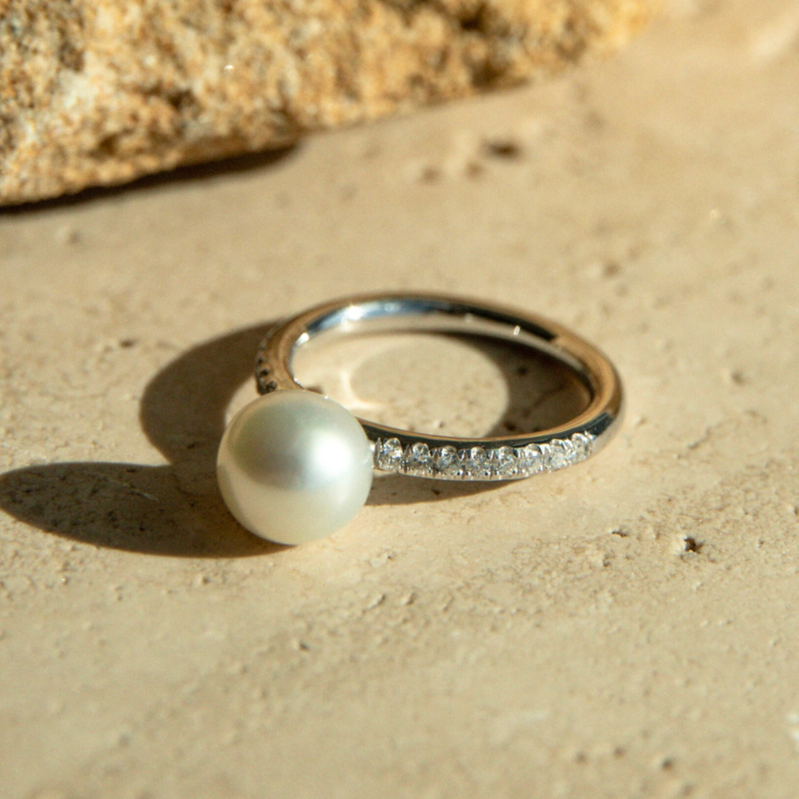 This Eternal Petite Diamond &Akoya Pearl Ring features a Broken Bay (NSW) grown 8mm AAA grade Australian Akoya pearl set on a band with a row of 18 White Diamonds (0.18ct H/SI) in 9ct gold.