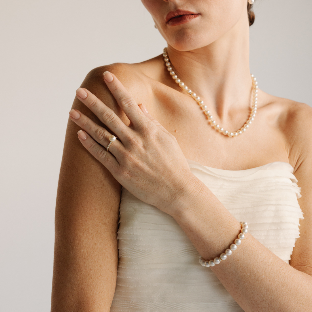 This Eternal Akoya & Diamond Strand Bracelet features twenty-one (21) Broken Bay (NSW) grown 7.5mm AAA grade Australian Akoya pearl set alongside two White Diamond rondels (0.22ct H/SI).