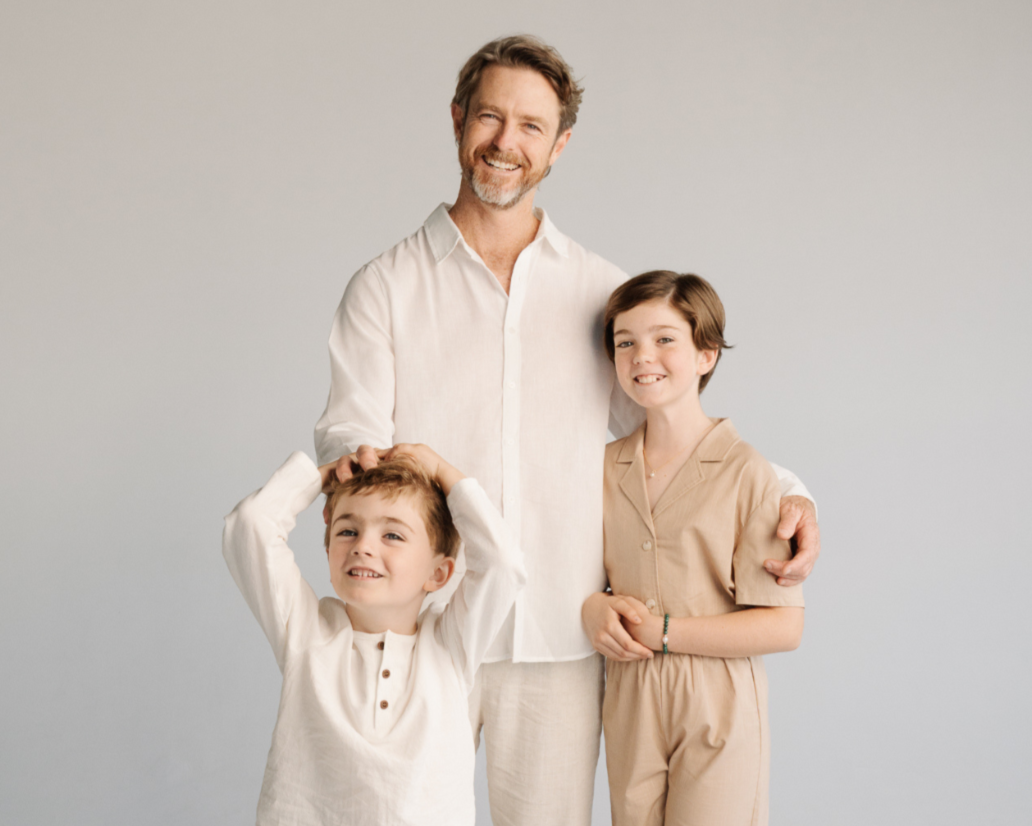 Man and his two children wearing their Australian pearl jewellery pieces.