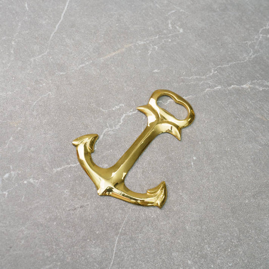 Crafted from high-quality stainless steel with a luxurious gold finish, this bottle opener is not only functional but also adds a touch of elegance to any entertaining occasion. Its unique anchor design pays homage to coastal living, making it a great gift for him or a stylish accessory for your own bar.