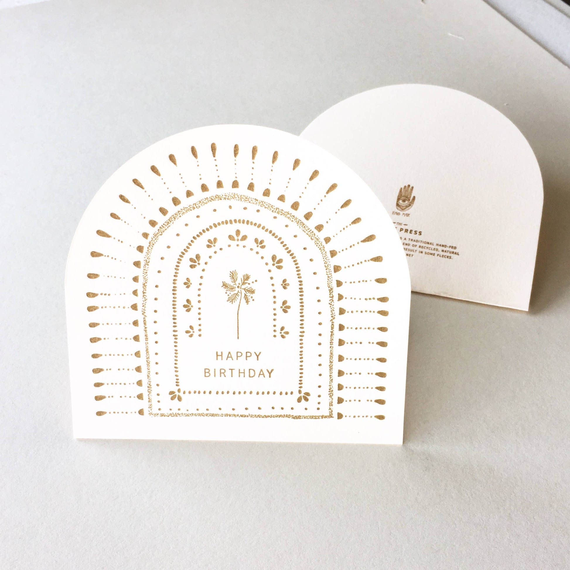 Letterpress printed and die-cut, creating an arch when folded - like a paper hug!