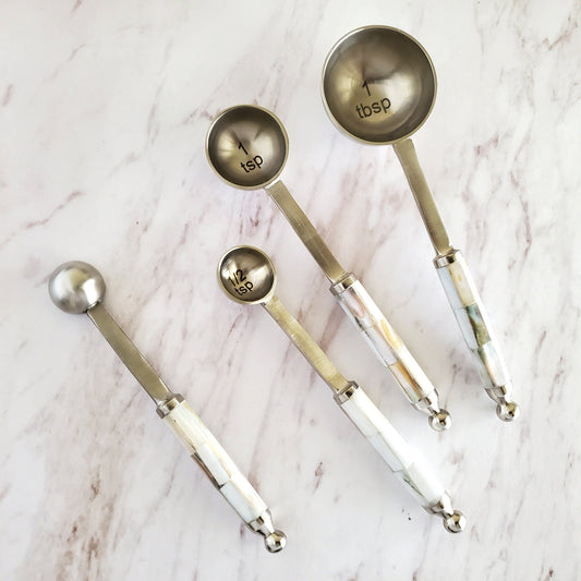 The handle of each measuring cup and spoon is carefully crafted with pieces of Mother of Pearl embedded in stainless steel. Skilled Artisans ensures smoothness of the handle and exquisite integration with Mother of Pearl.