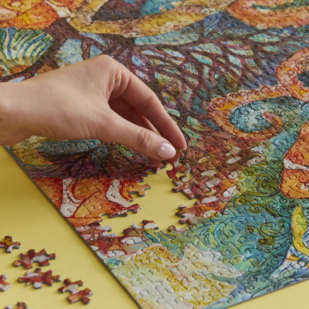This mesmerising puzzle features a vibrant and detailed illustration of an underwater scene filled with marine life, which transforms into a glowing wonder when the lights go out.