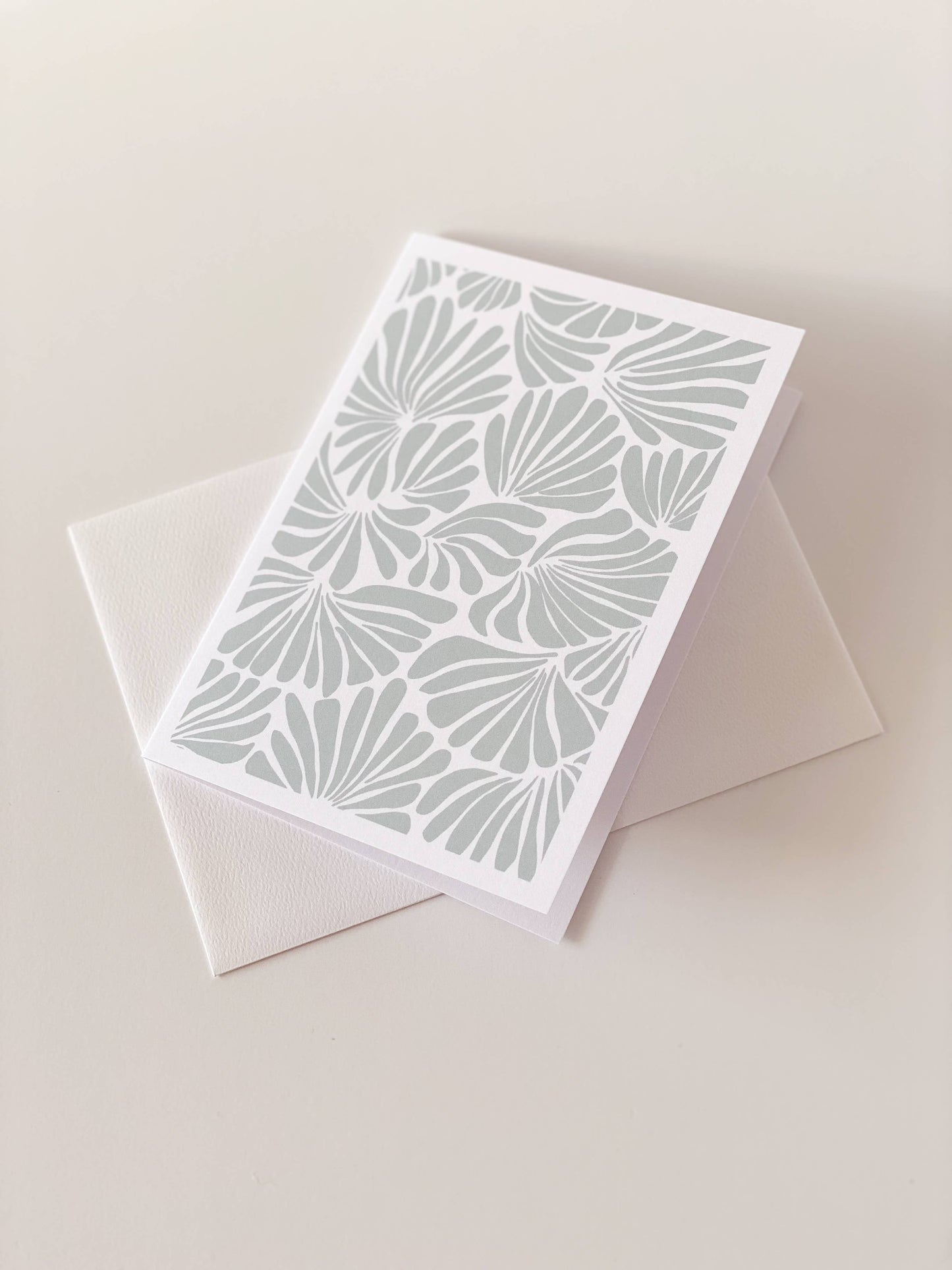 Card with geometric pattern on a beige background
