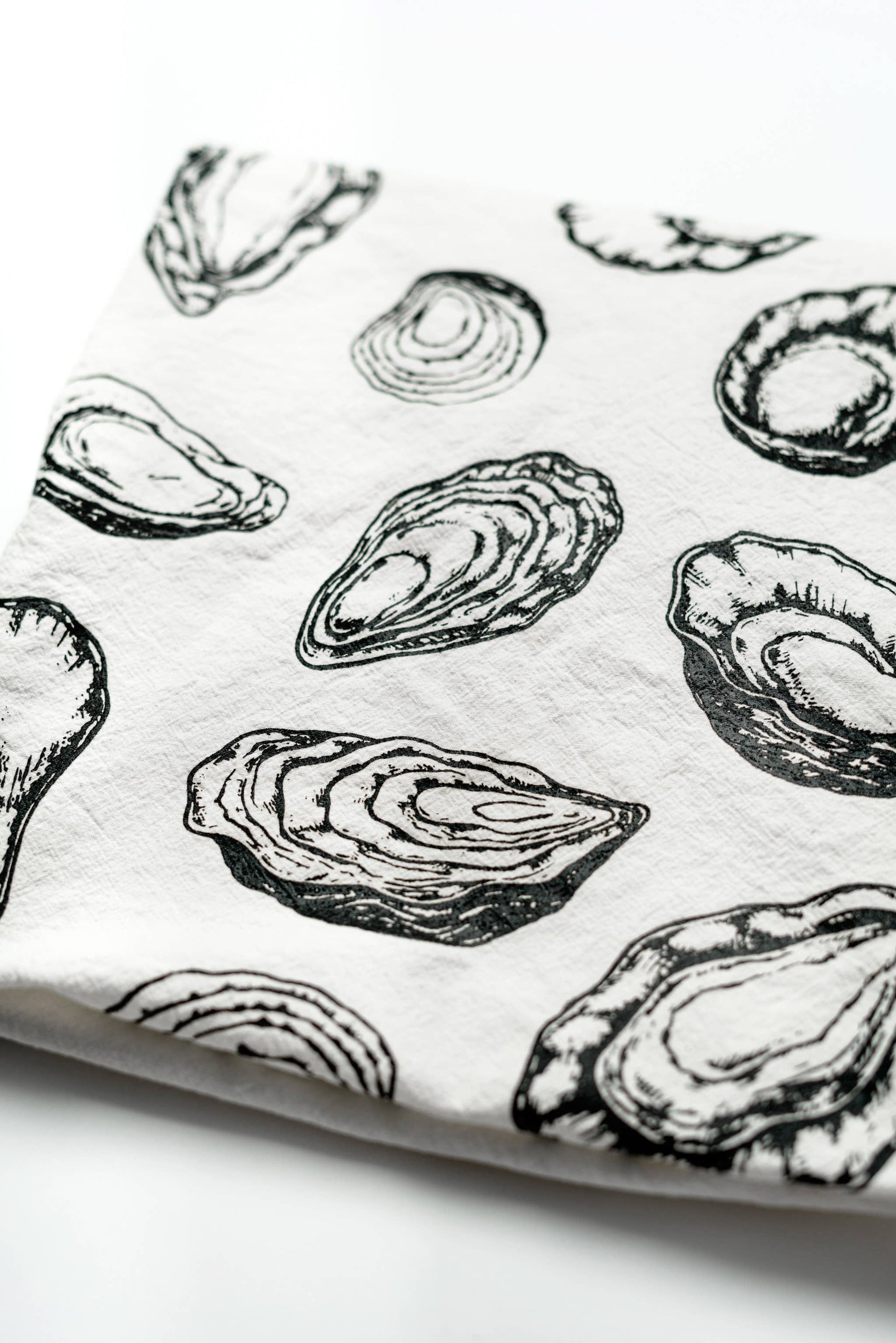 Pattern of oyster shells on a white background