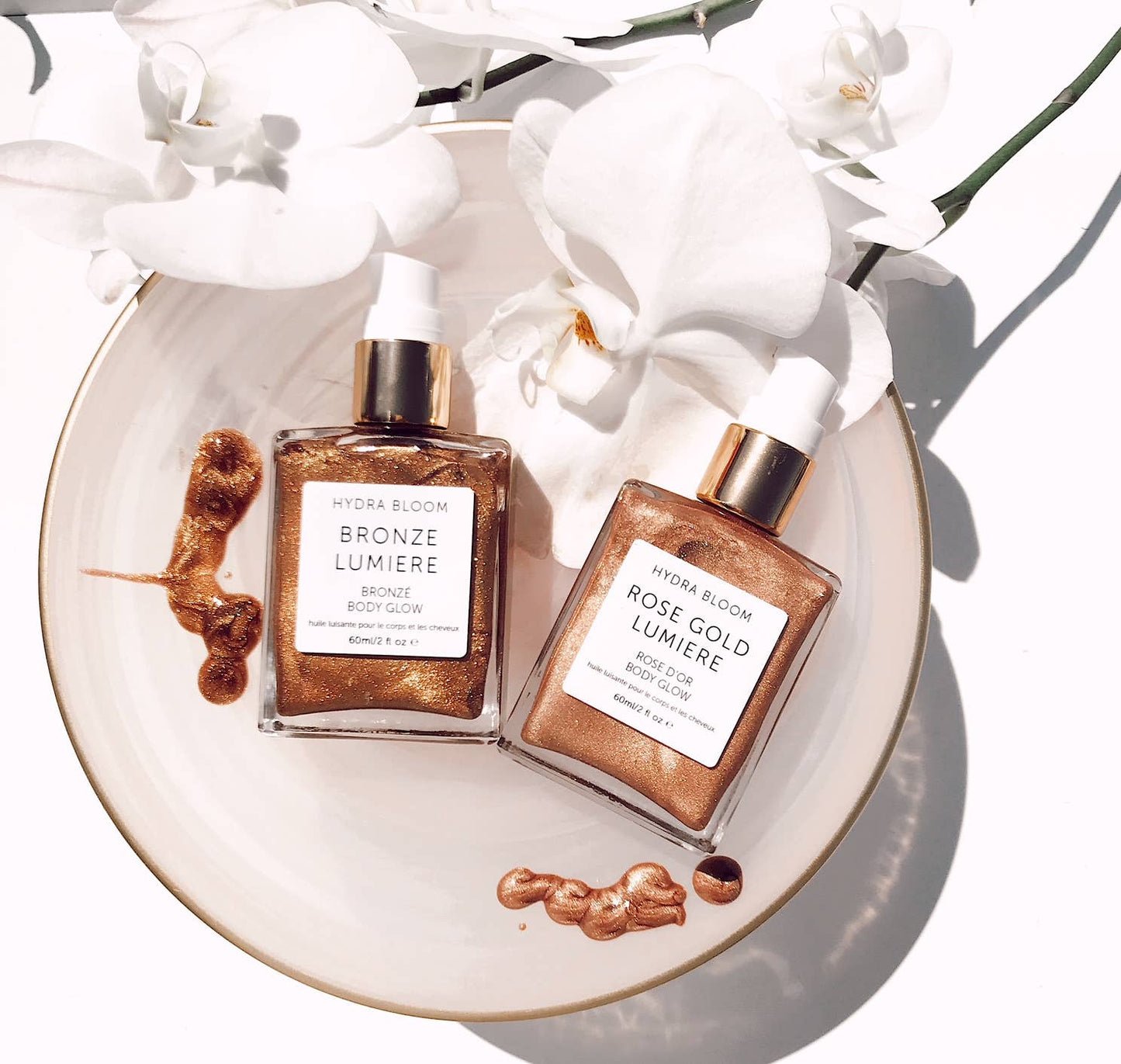 Shimmer like a luminous angel with pearl frangipani shimmer oil. Pearl is our champagne toned shimmer color which suits all skin tones. Ingredients: argan oil, coconut oil, mica minerals, flower essences. Pearl shimmer oil delivers luminous glowing skin.