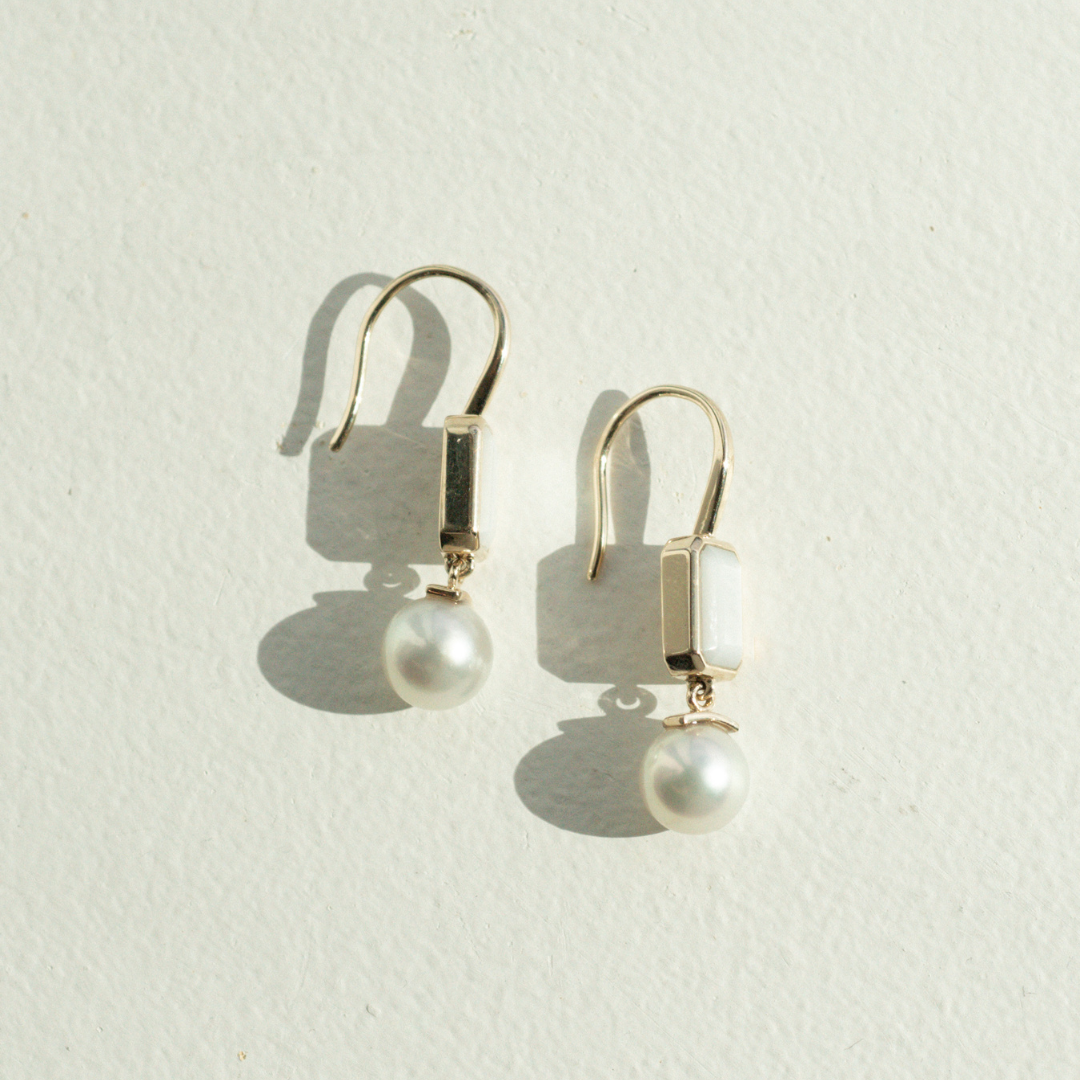This stunning Radiance Emerald Cut & Pearl Hook Earring features faceted Mother of Pearl grown at our Cygnet Bay Pearl Farm (WA) alongside a Broken Bay (NSW) grown Australian Akoya pearl.