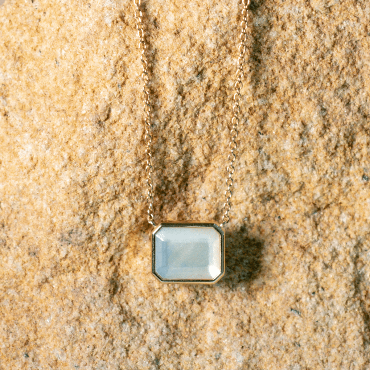 This stunning Radiance Emerald Cut Necklace features faceted Mother of Pearl grown at our Cygnet Bay Pearl Farm set in gold.