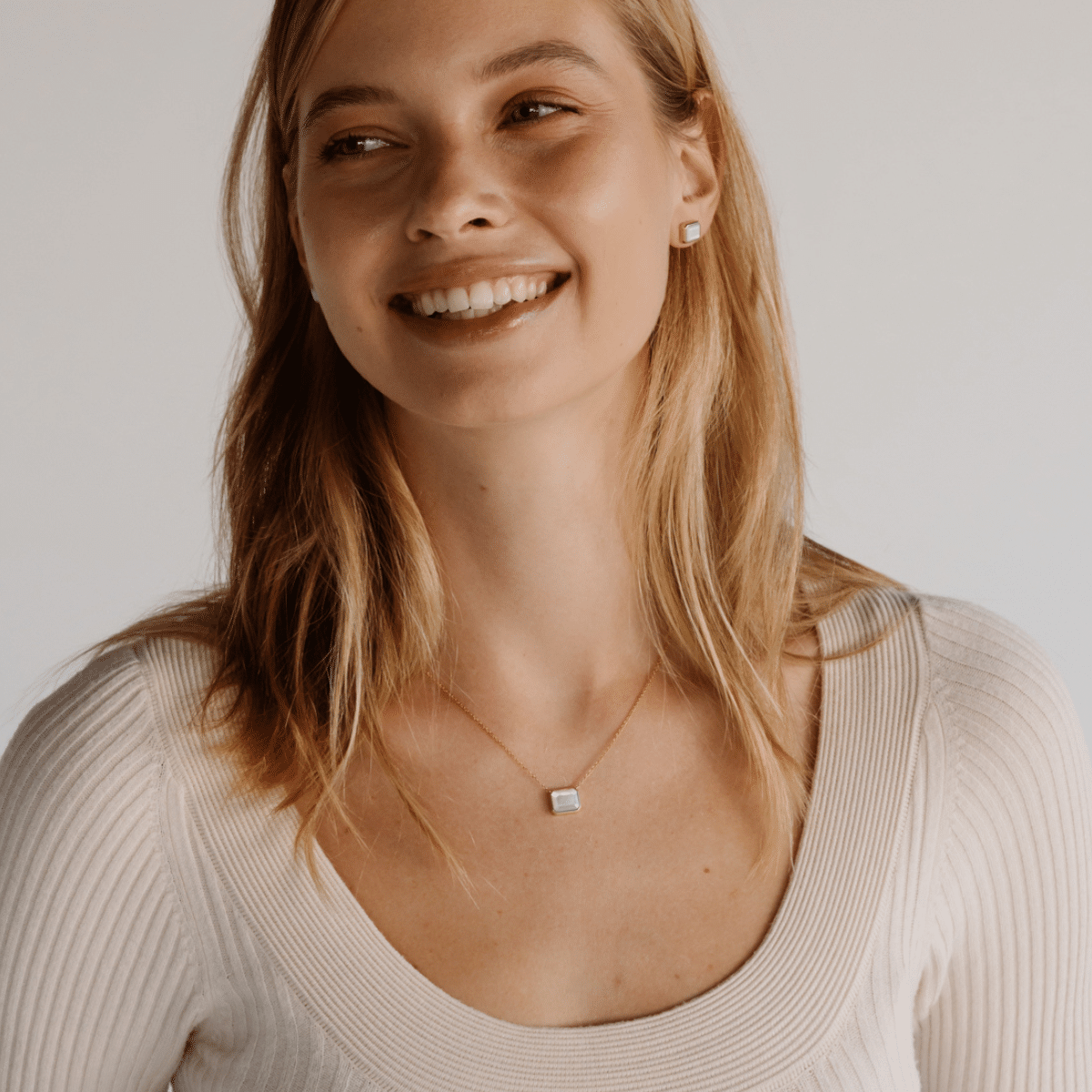 This stunning Radiance Emerald Cut Necklace features faceted Mother of Pearl grown at our Cygnet Bay Pearl Farm set on a gold chain.