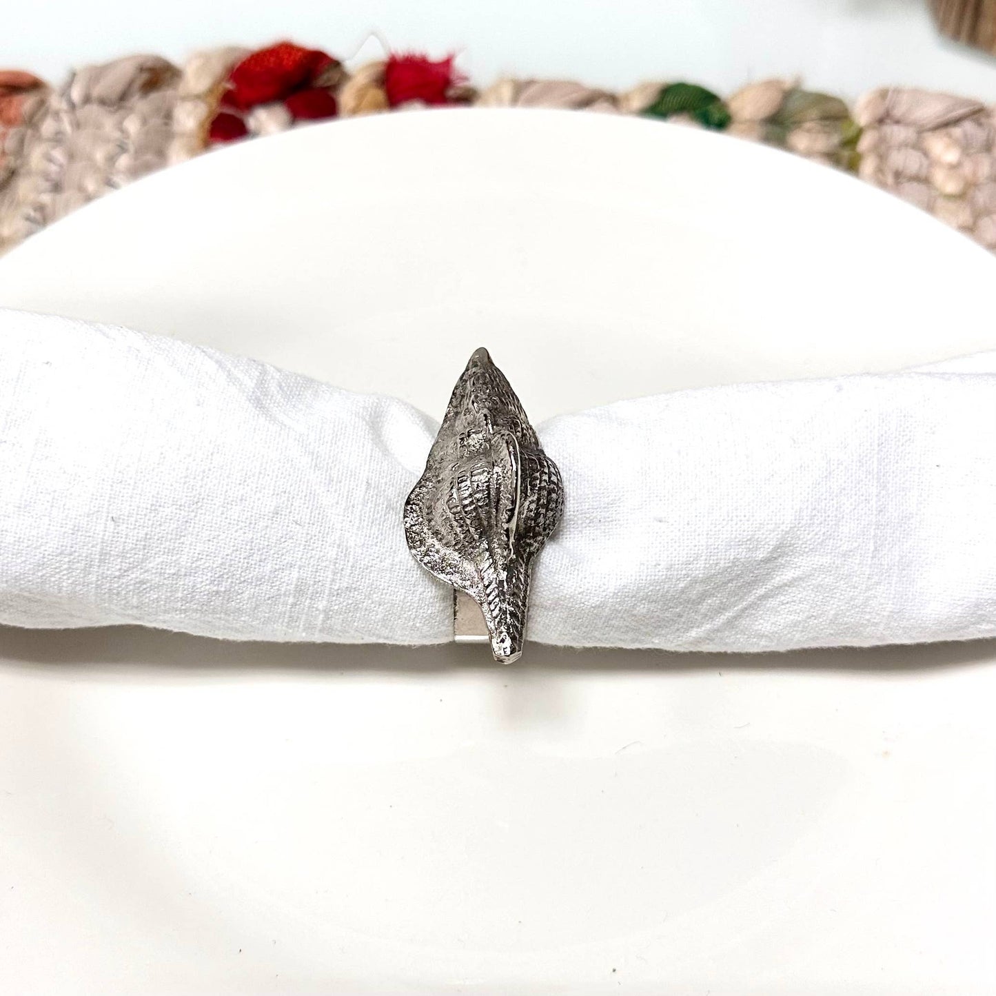 With a set of 12, it is perfect for entertaining guests and adding a touch of elegance to any table setting. Whether you're hosting a formal dinner party or a casual gathering, these napkin rings will effortlessly elevate your home decor.