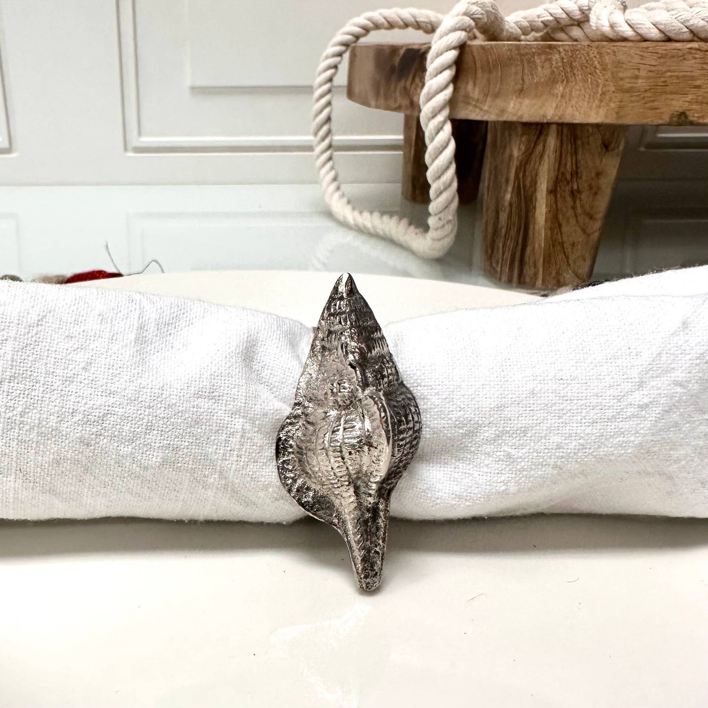 With a set of 12, it is perfect for entertaining guests and adding a touch of elegance to any table setting. Whether you're hosting a formal dinner party or a casual gathering, these napkin rings will effortlessly elevate your home decor.