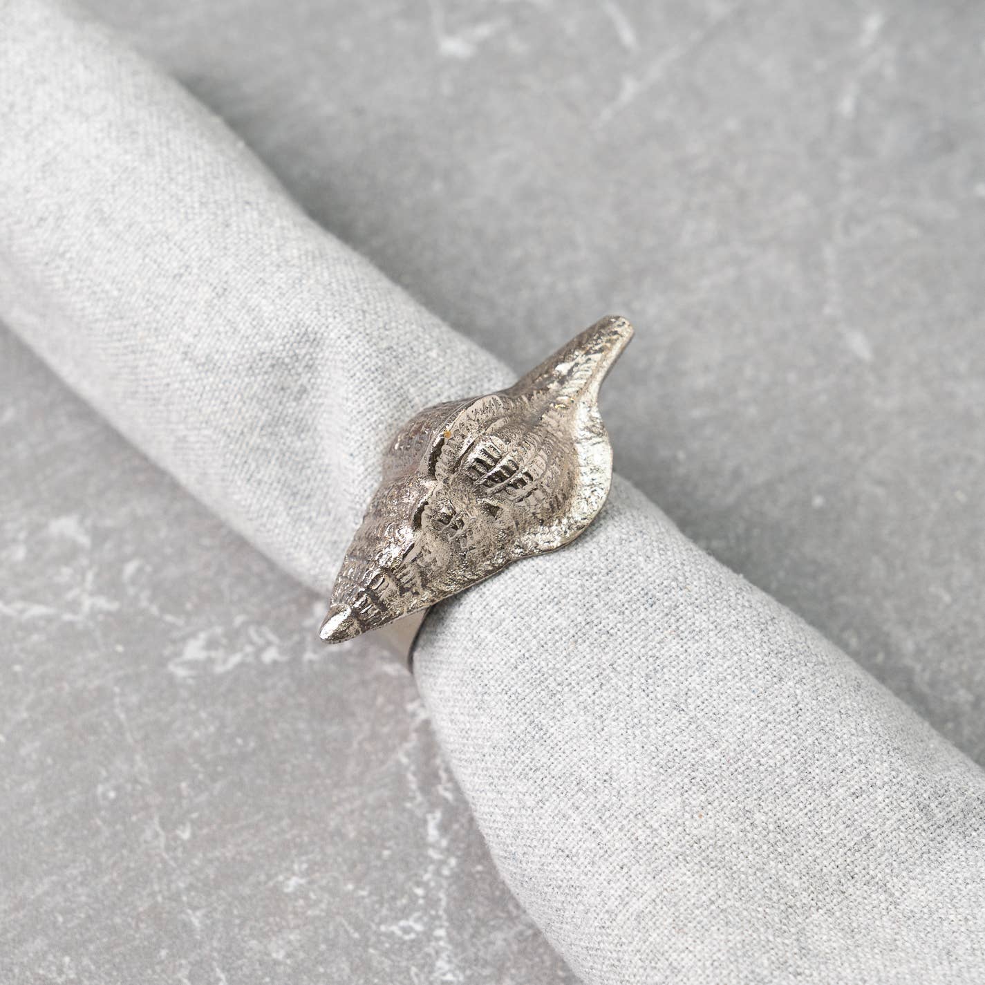 With a set of 12, it is perfect for entertaining guests and adding a touch of elegance to any table setting. Whether you're hosting a formal dinner party or a casual gathering, these napkin rings will effortlessly elevate your home decor.