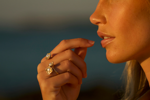 A woman wears her stunning Kimberley Lily Float Ring which features our Australian South Sea Keshi pearls set on a fine solid gold ring.