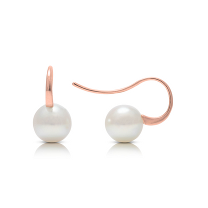 A pair of Australian Akoya pearl hook earrings set in rose gold.