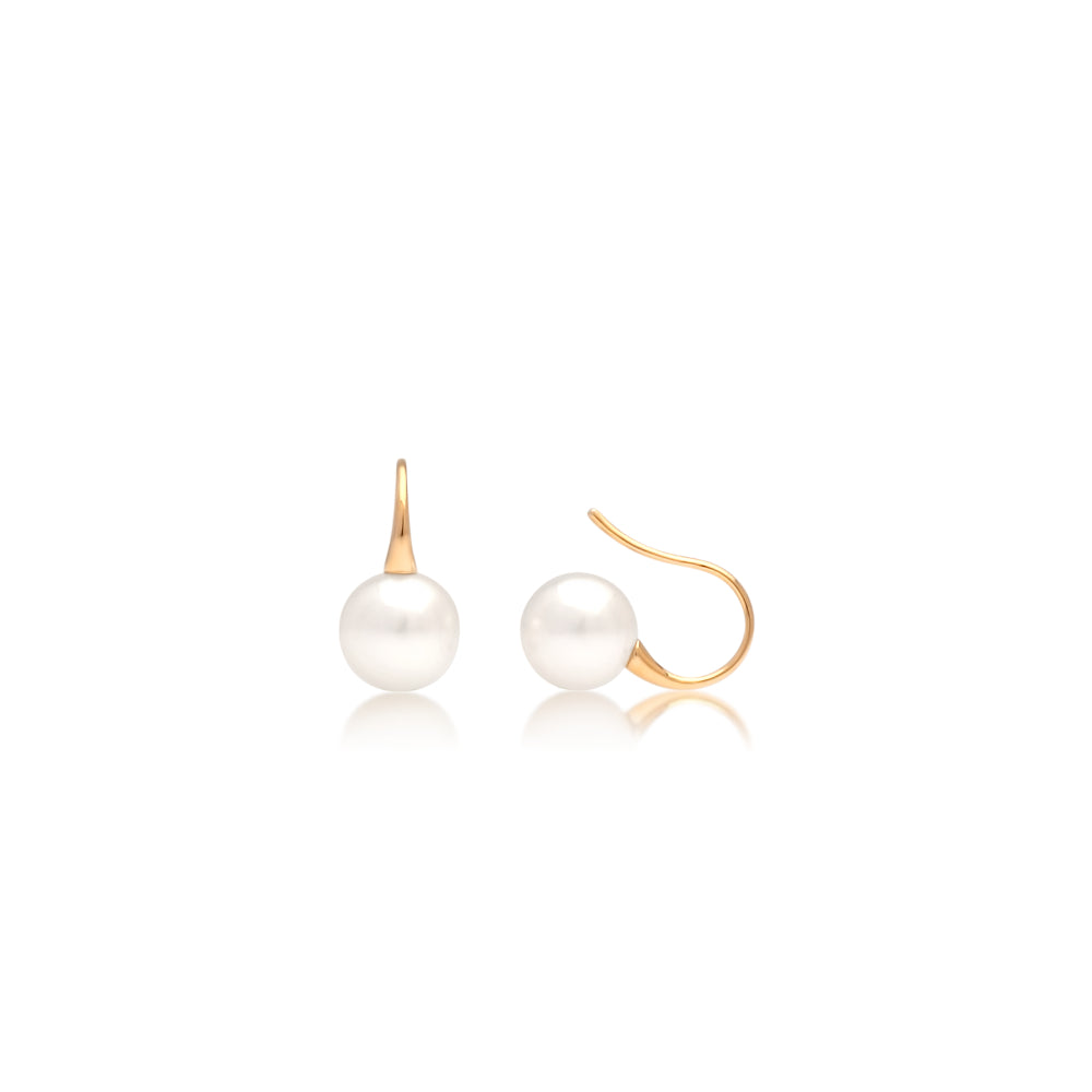 A pair of stunning Acacia Petite Pearl Hook Earrings featuring our Broken Bay grown Australian Akoya pearls set in yellow gold.