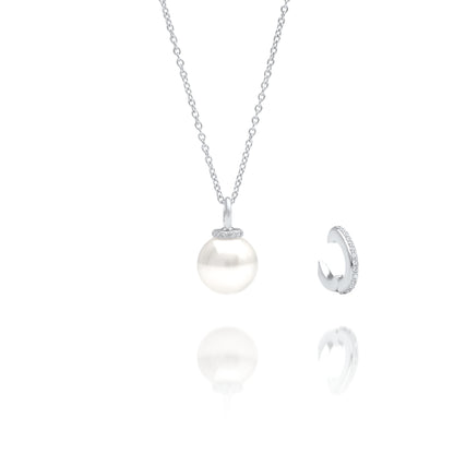 A beautiful pendant featuring an Australian South Sea pearl set in white gold, with stunning white diamonds surrounding the pearl. The pendant has a detachable mechanism for versatility in wear.