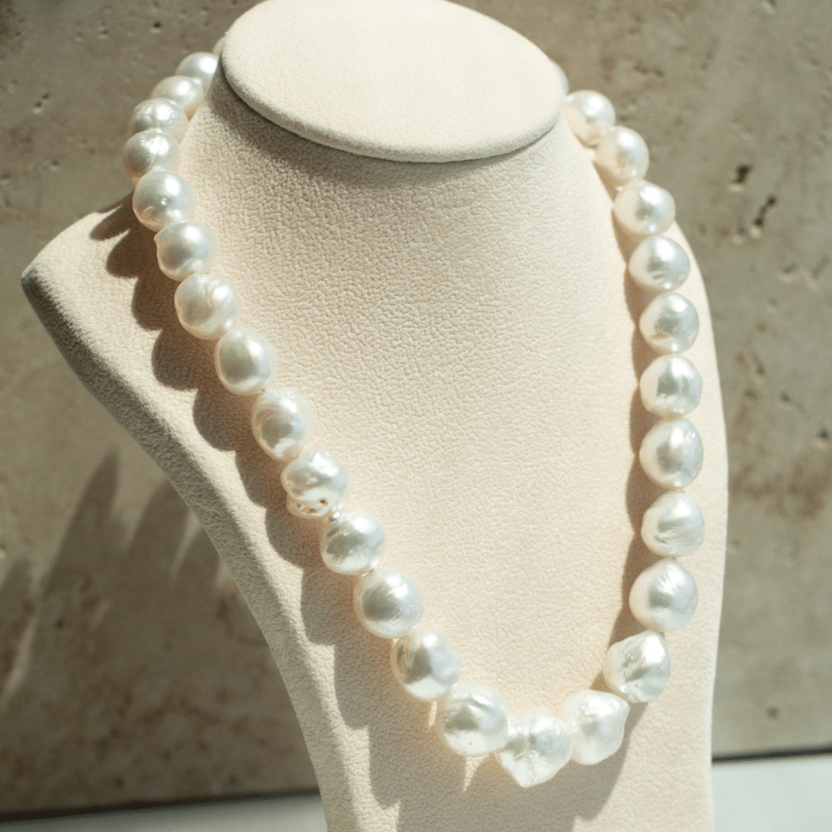 This striking Pearl Strand Necklace features thirty-one (31) 11 to 15.5mm Baroque A3+ to B2+ grade Cygnet Bay (WA) grown Australian South Sea pearls. This pearl strand is set with a 18ct White Gold clasp.