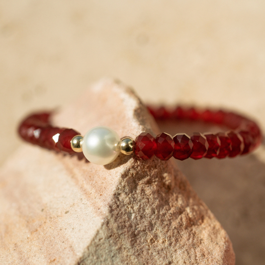 Featuring a luminous Cygnet Bay (WA) grown 8.5mm Round B1 grade Australian South Sea pearl nestled alongside 41 faceted carnelian beads and two 9ct yellow gold rondels