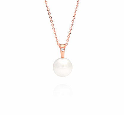 A beautiful Australian South Sea pearl pendant set in rose gold with a single white diamond.