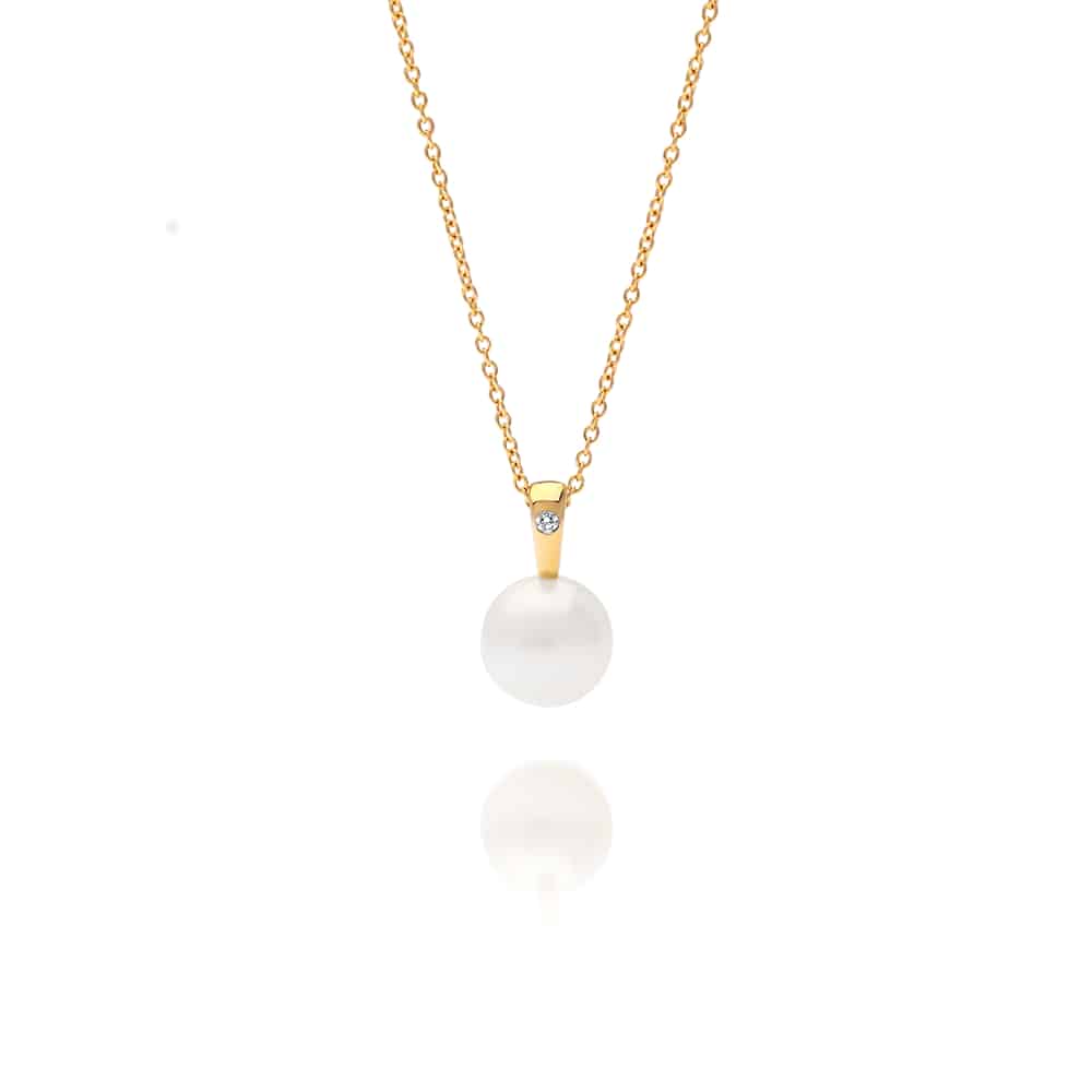 A beautiful Australian South Sea pearl pendant set in yellow gold with a single white diamond.