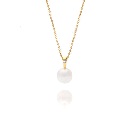 A beautiful Australian South Sea pearl pendant set in yellow gold with a single white diamond.