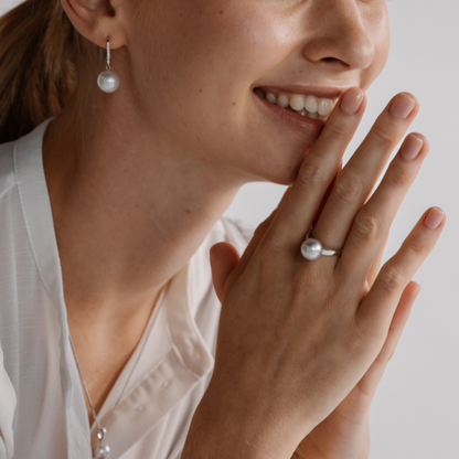 A woman wears her stunning Cocos Pearl Ring featuring Cygnet Bay grown Australian South Sea pearl set in gold.