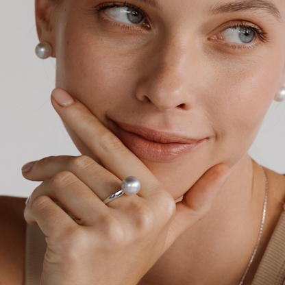 A woman wears her stunning Cocos Pearl Ring featuring Cygnet Bay grown Australian South Sea pearl set in gold.