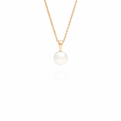 An Australian South Sea Cocos Drop pearl pendant set in yellow gold.