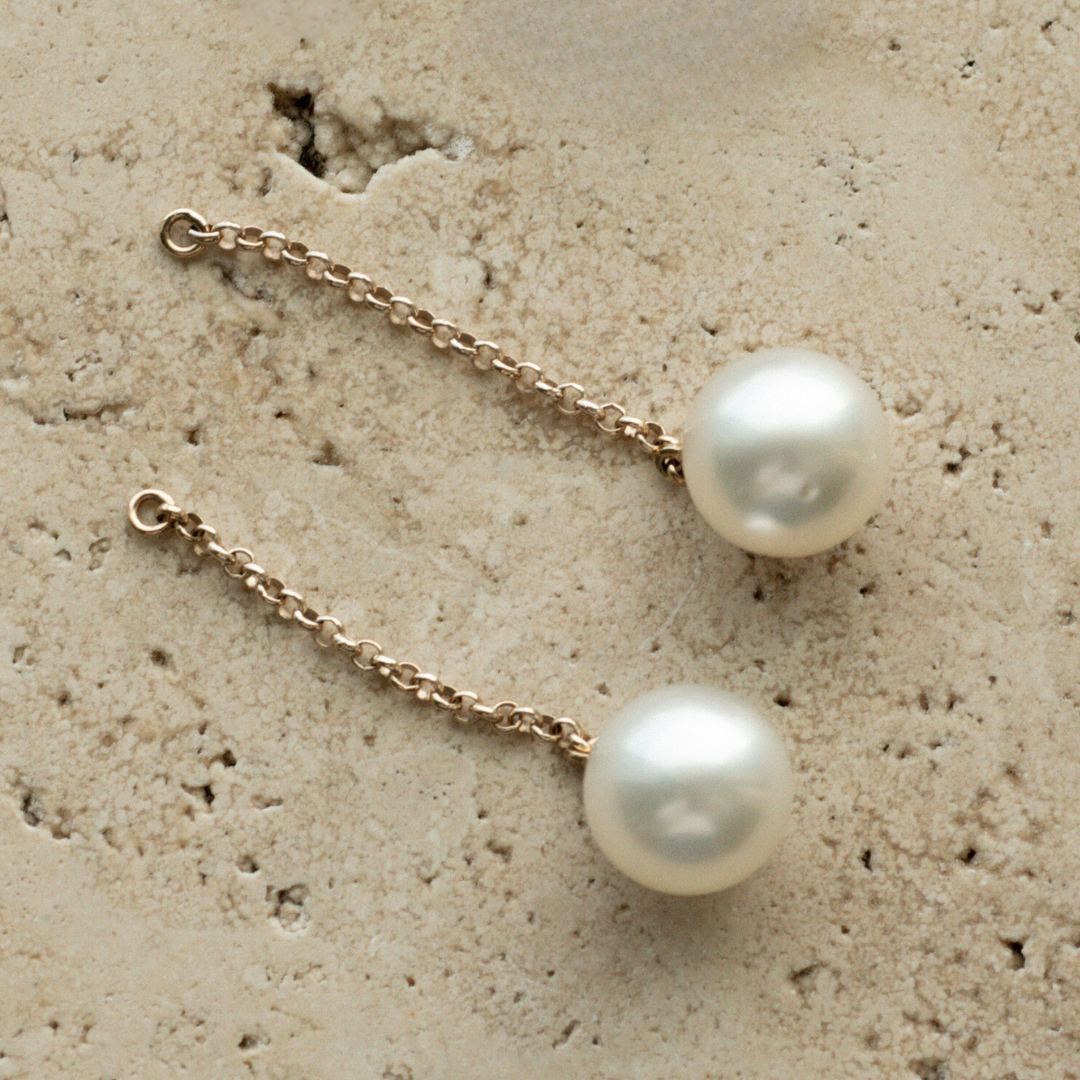 This incredible Detachable Provenance Pearl Earrings features Cygnet Bay (WA) grown Australian South Sea pearls set on a gold chain, which can be attached to any pair of stud earrings.