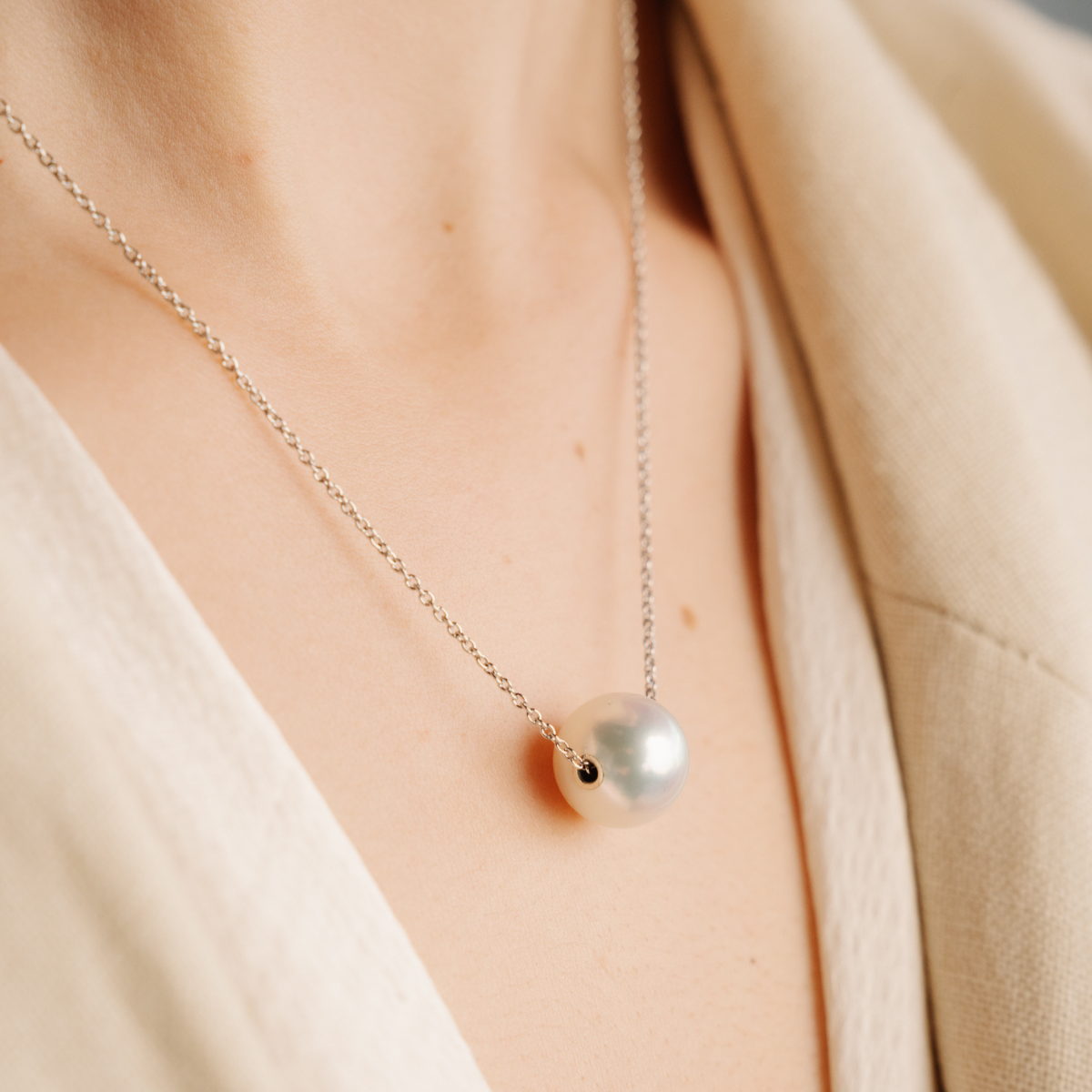 This oscillating classic, the Drifting Pearl Necklace, features a Cygnet Bay (WA) grown 10.5mm Round A3 grade Australian South Sea pearl that’s sealed with gold, set on an adjustable 45cm gold chain and parrot clasp.