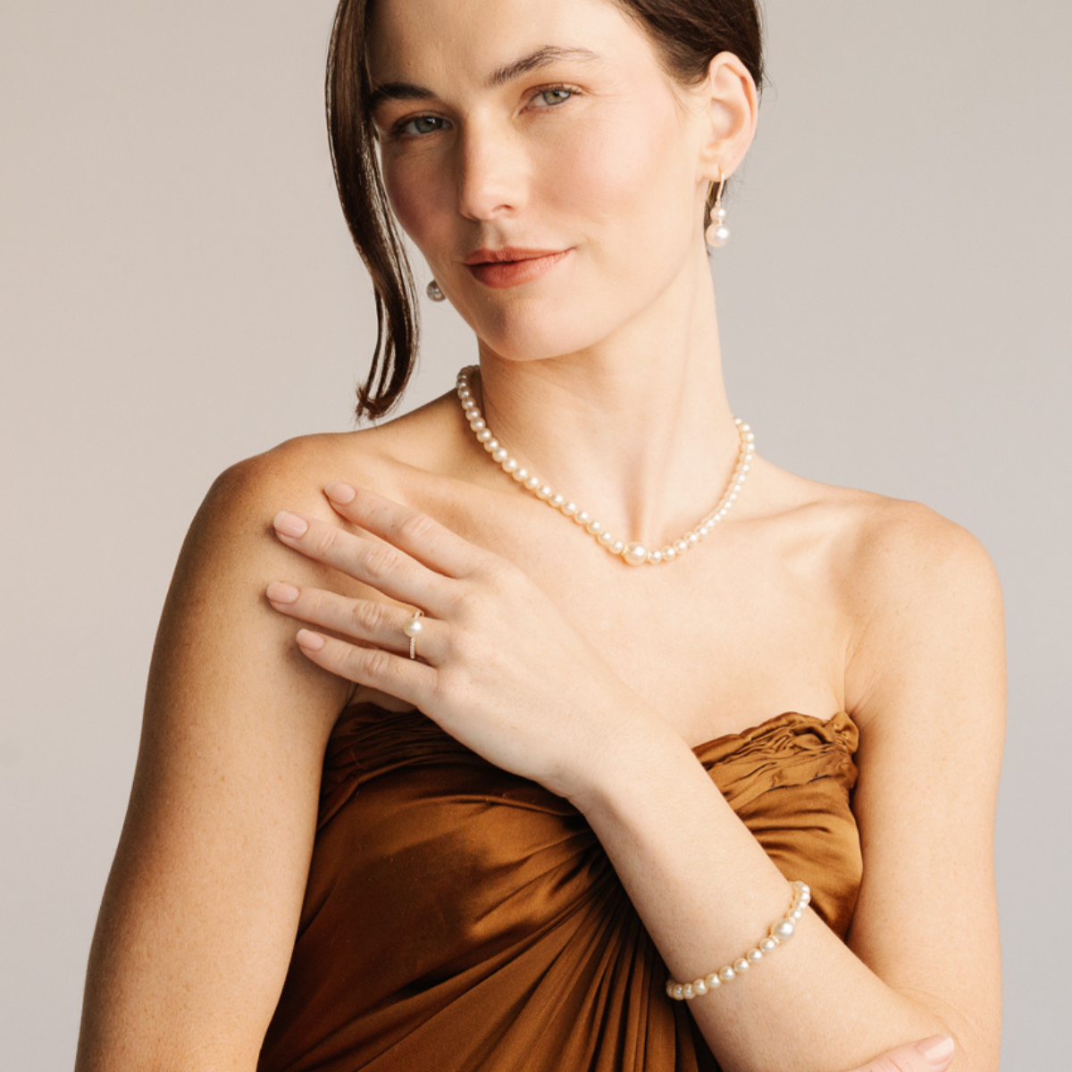 This Eternal South Sea & Akoya Pearl Strand Bracelet features twenty-four (24) Broken Bay (NSW) grown 7.5mm AAA grade Australian Akoya pearls with one (1) Cygnet Bay (WA) grown 10mm Round B1 grade Australia South Sea pearl set alongside two White Diamond rondels (0.22ct H/SI).