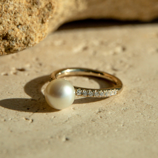 This Eternal Petite Diamond &Akoya Pearl Ring features a Broken Bay (NSW) grown 8mm AAA grade Australian Akoya pearl set on a band with a row of 18 White Diamonds (0.18ct H/SI) in 9ct gold.