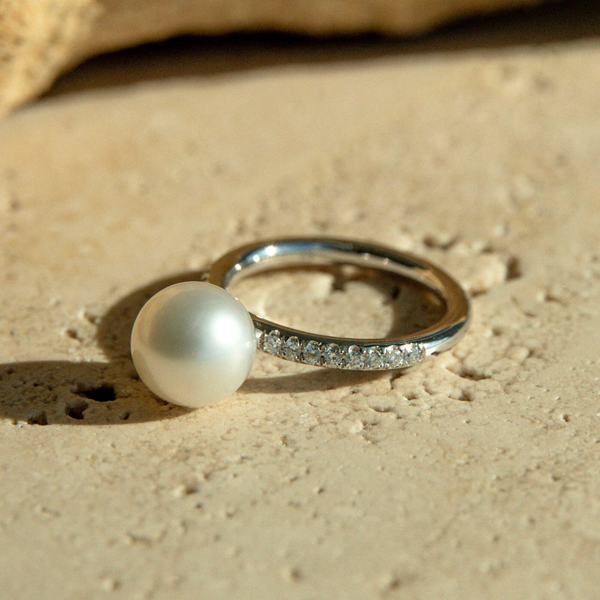 This Eternal Petite Diamond & South Sea Pearl Ring features a Cygnet Bay (WA) grown 9mm Round A3 grade Australian South Sea pearl set on a band with a row of 18 White Diamonds (0.18ct H/SI) in 9ct gold.