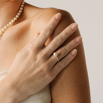 This Eternal Petite Diamond &amp; Akoya Pearl Ring features a Broken Bay (NSW) grown 8mm AAA grade Australian Akoya pearl set on a band with a row of 18 White Diamonds (0.18ct H/SI) in 9ct gold.