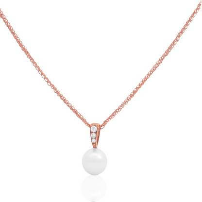 This Eternal Petite Pearl Pendant features a Broken Bay (NSW) grown Australian Akoa pearl set alongside a row of White Diamonds in yellow gold.