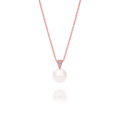 A beautiful Australian South Sea pearl pendant set with a stunning array of white diamonds in rose gold. 