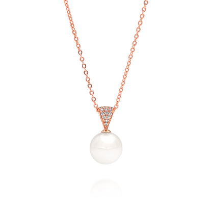 A magnificent pearl pendant featuring an Australian South Sea pearl set alongside a myriad of white diamonds in rose gold.