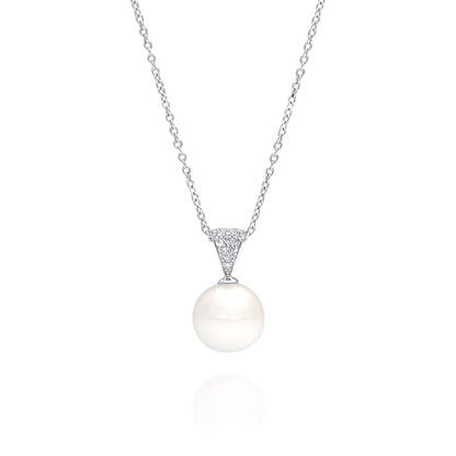 A magnificent pearl pendant featuring an Australian South Sea pearl set alongside a myriad of white diamonds in white gold.