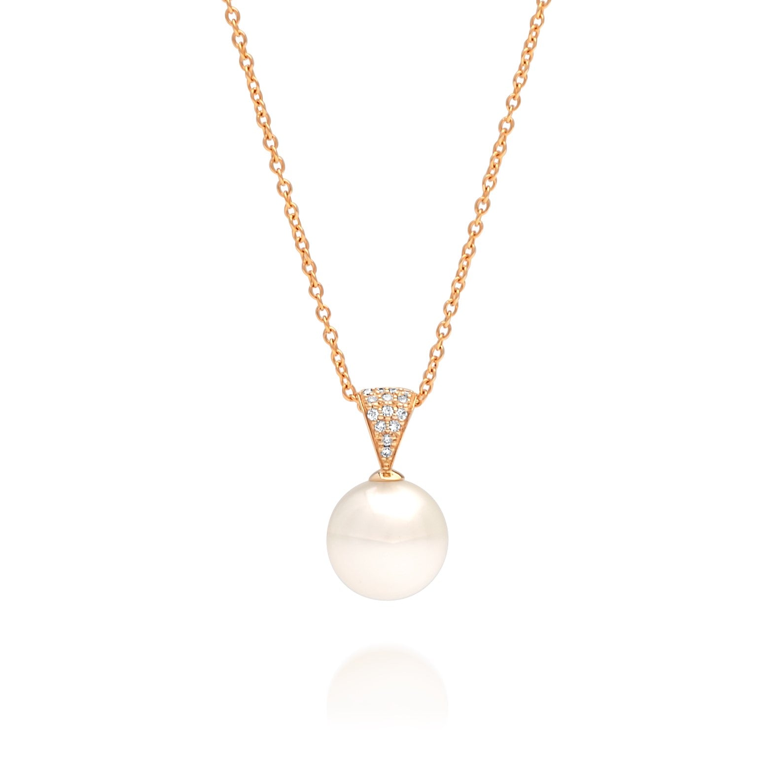 A magnificent pearl pendant featuring an Australian South Sea pearl set alongside a myriad of white diamonds in yellow gold.