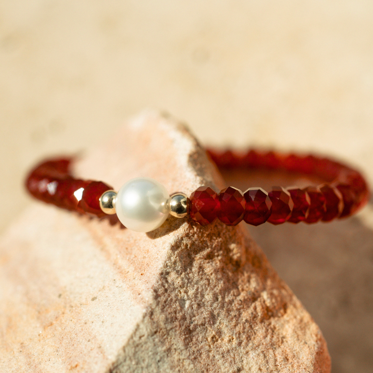 Featuring a luminous Cygnet Bay (WA) grown 9mm Round B1 grade Australian South Sea pearl nestled alongside 41 faceted carnelian beads and two 9ct yellow gold rondels, this bracelet captures the new year spirit.