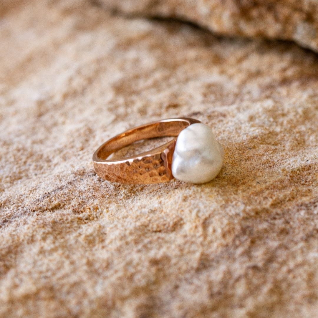 A beautiful Impressions Pearl Keshi Ring set in a hammered gold design.