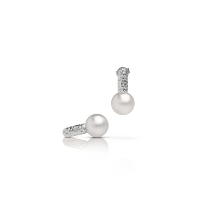 A pair of stunning Australian South Sea pearls set in a hammered white gold design.