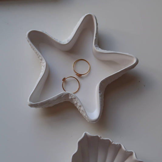 Elegant and aesthetically pleasing, our Seastar Jewellery Dish will look beautiful on your nightstand.  Seastar trays are a fantastic addition to your home style, they are designed for decorative purposes and can be styled on your coffee table with some aesthetic magazines, on your night stand to display your jewellery and the list can go on.

