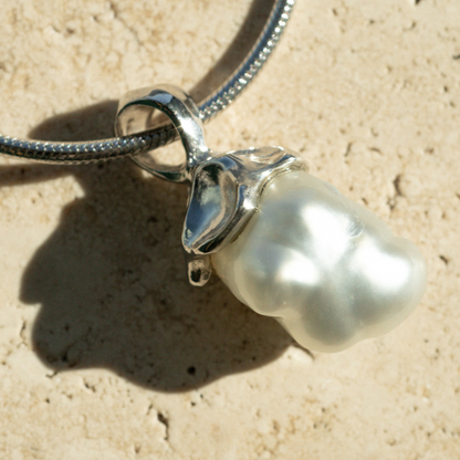 This stunning Keepsake Pearl Pendant features a Cygnet Bay (WA) grown Australian South Sea Keshi pearl set in a bespoke gold design.