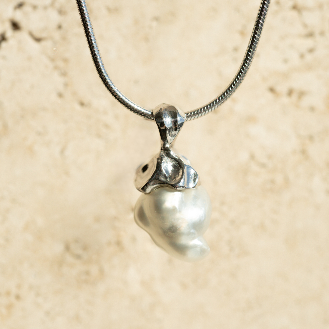 This stunning Keepsake Pearl Pendant features a Cygnet Bay (WA) grown Australian South Sea Keshi pearl set in a bespoke gold design.