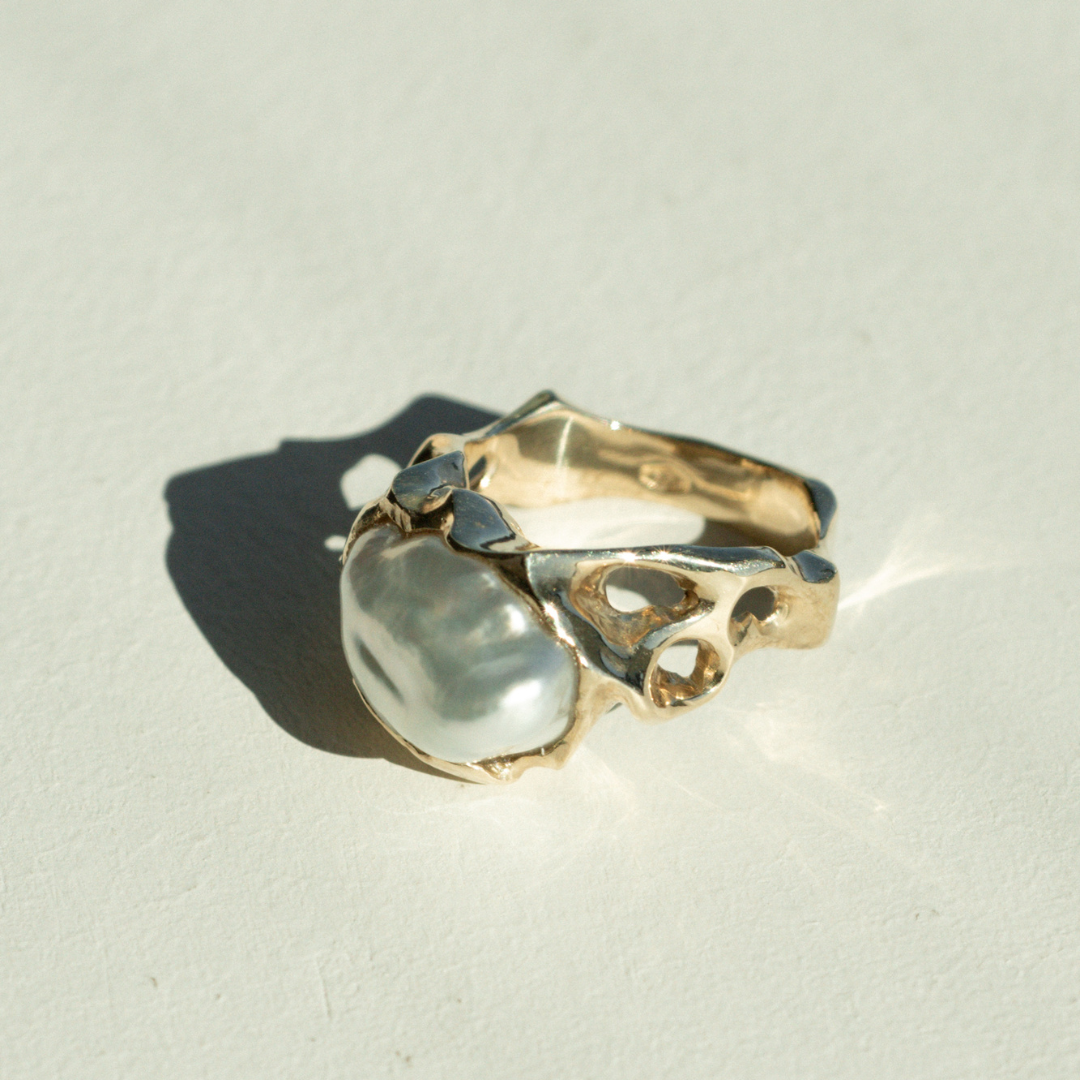 This stunning Keepsake Pearl Ring features a Cygnet Bay (WA) grown Australian South Sea Keshi pearl set in a bespoke gold design.