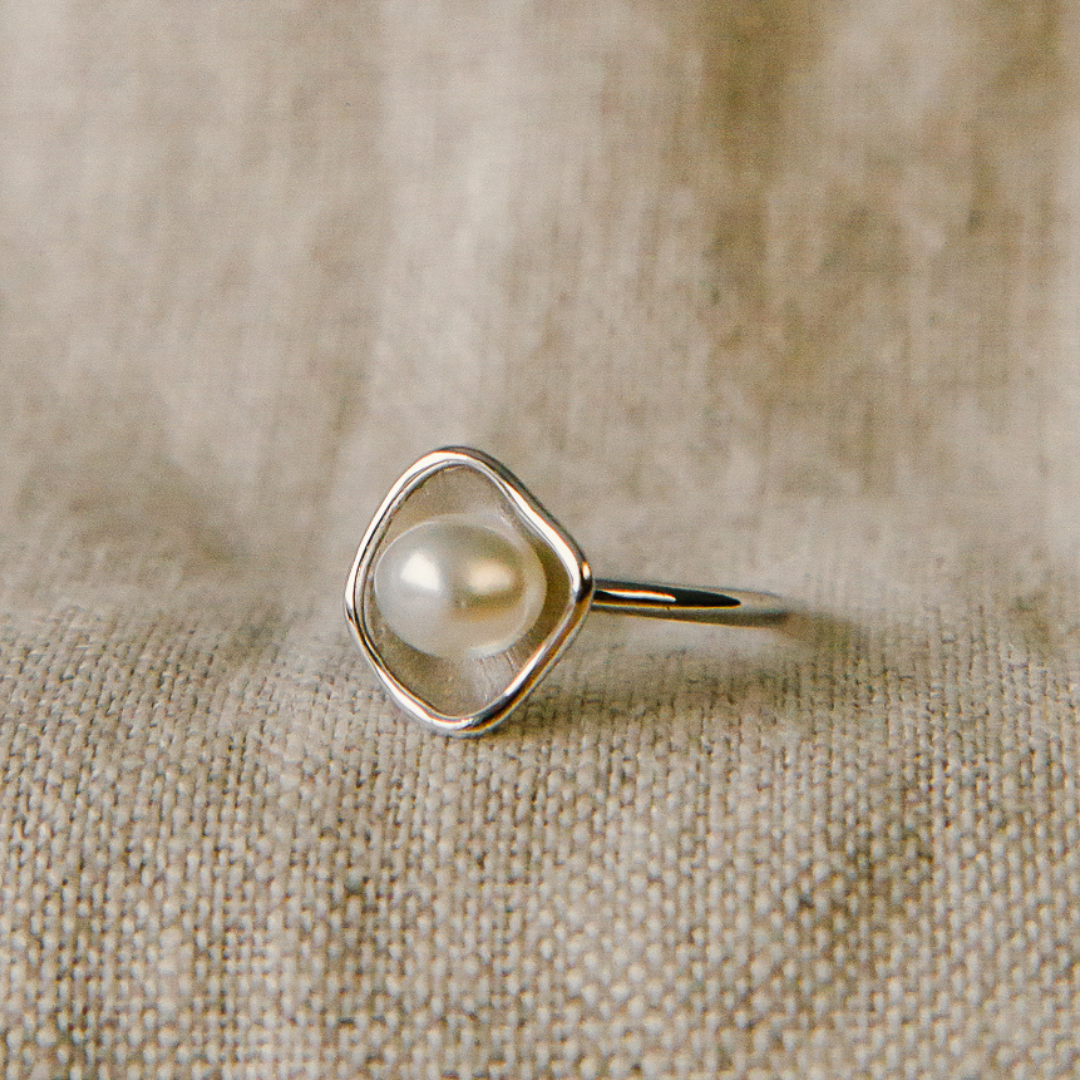 A beautiful Kimberley Lily Ring featuring a Cygnet Bay grown Australian South Sea Keshi pearl set in a unique lily inspired design.